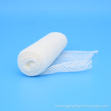 White conforming surgical dressing gauze roll bandage